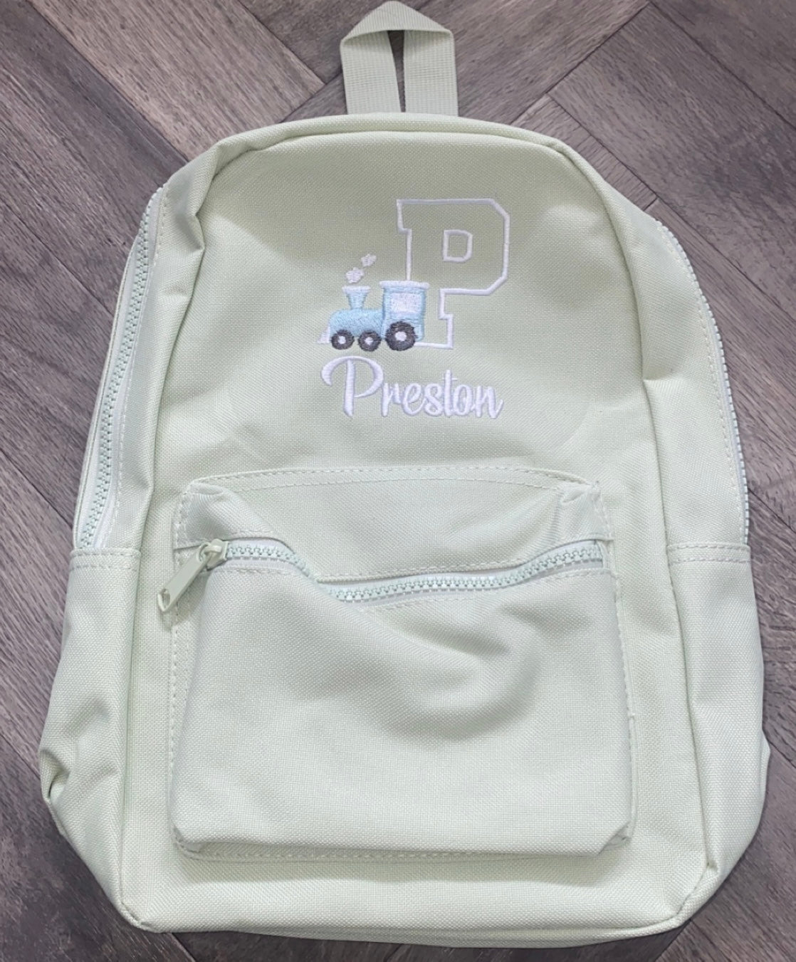 Train Initial Backpack