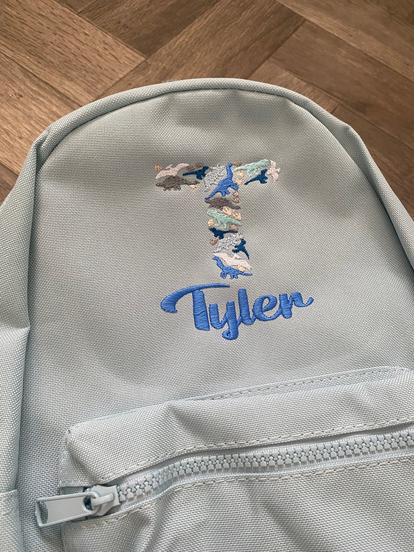 Dinosaur initial Backpack