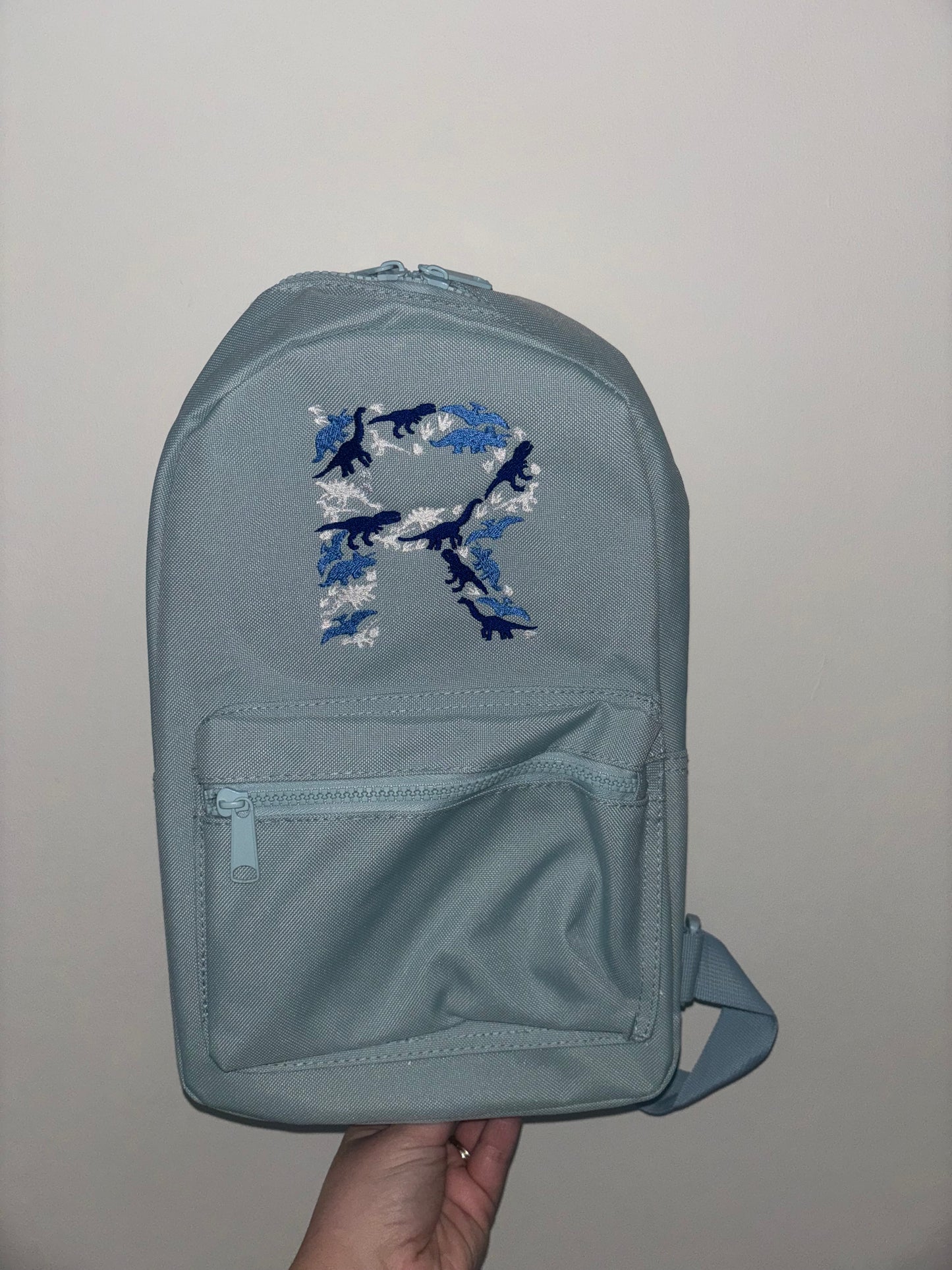 Dinosaur initial Backpack