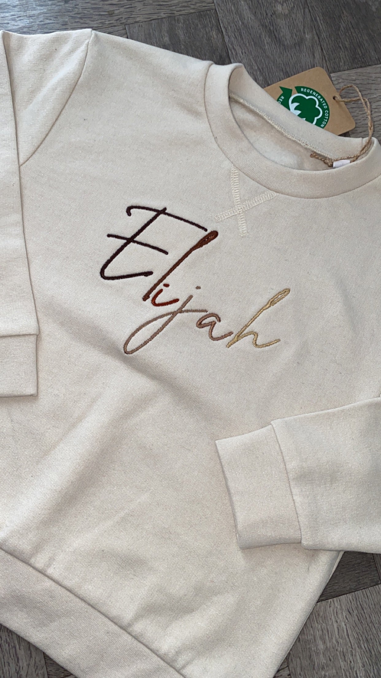 Nude Jumper with Brown Signature Font